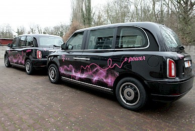 Fahrzeugbeschriftung London Taxi Der Telekom 