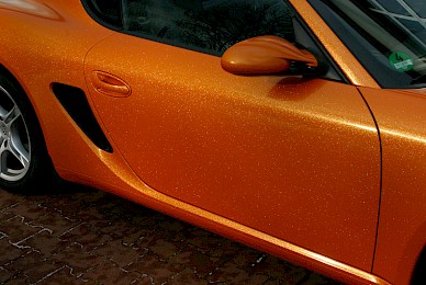 Vollverklebung Porsche Cayman Von Dunkelblau In Orange Glitzer Und Schwarz Matt  (Bild 4/15)