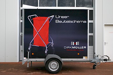 Fahrzeugbeschriftung Anhaenger Dirk Muller Gebaeudedienste 