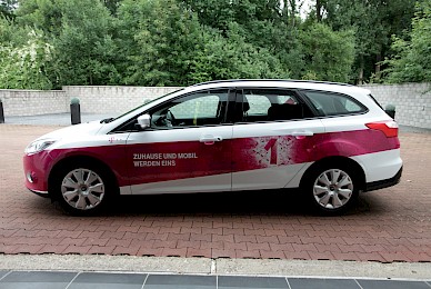 Fahrzeugbeschriftung Ford Focus Telekom Magenta Eins 