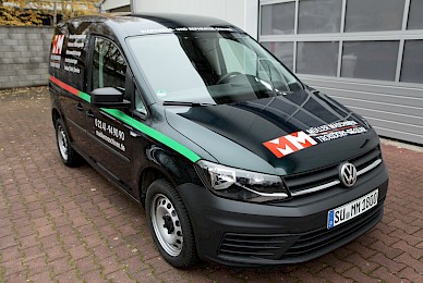 Vollverklebung Vw Caddy In Sonderfarbe British Racing Green Metallic Und Beschriftung  (Bild 2/6)
