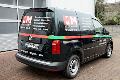 Vollverklebung Vw Caddy In Sonderfarbe British Racing Green Metallic Und Beschriftung  (Bild 3/6)