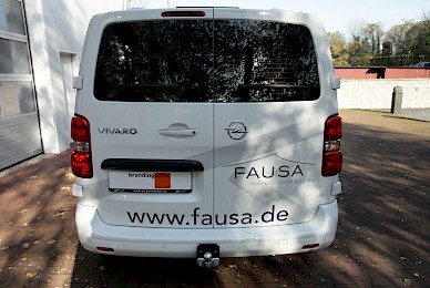Fahrzeugbeschriftung Opel Vivaro Fausa Wohnbau  (Bild 3/6)
