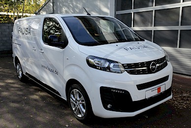 Fahrzeugbeschriftung Opel Vivaro Fausa Wohnbau 