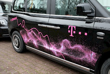 Fahrzeugbeschriftung London Taxi Der Telekom  (Bild 5/8)